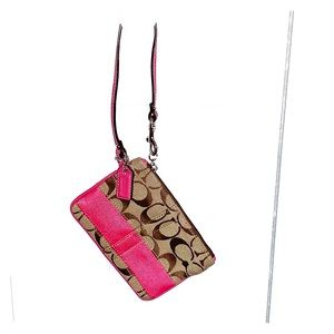 Brown and pink Coach Wristlet